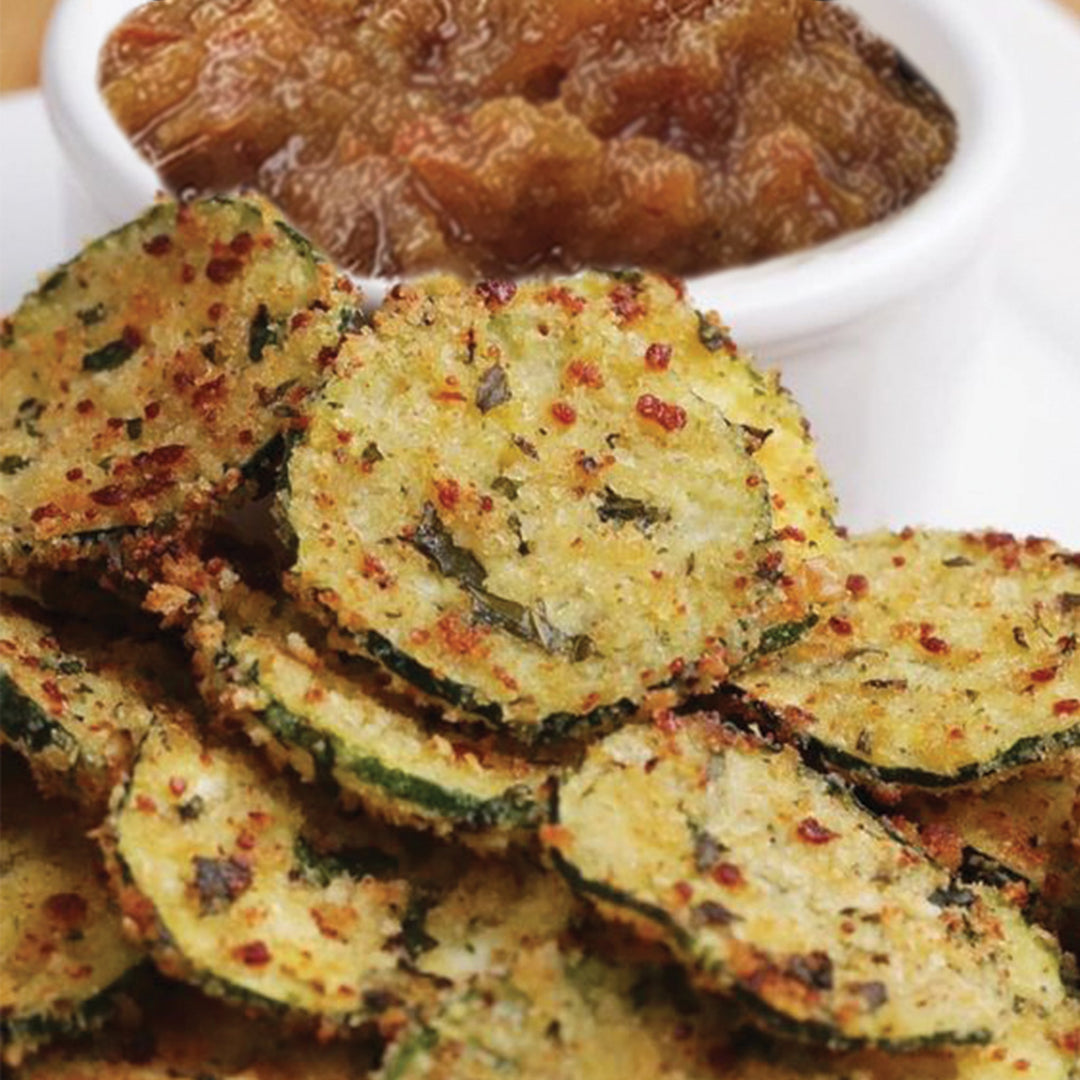 Panko and parmesan crumbed zucchini chips with Women's Work relish