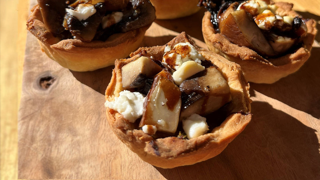 Caramelised onion relish and goats cheese tarts on Granny Ida's shortcrust