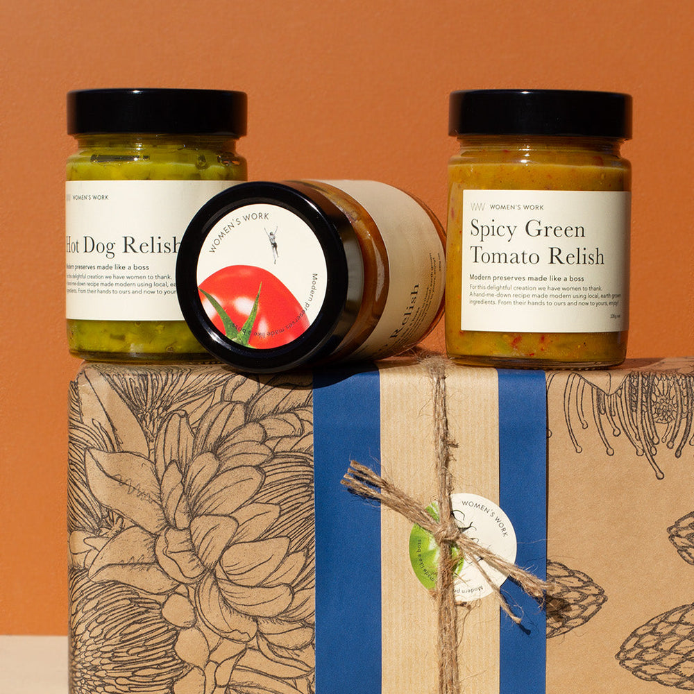 Women's Work Hot Dog Relish, Ripe Tomato Relish and Spicy Green Tomato relish on top of the Father's Day gift Box