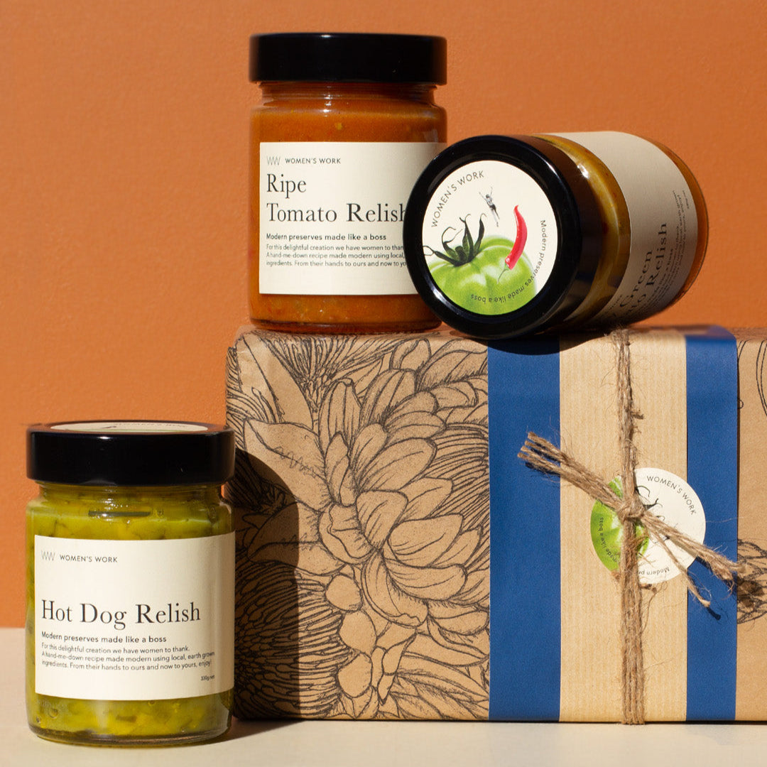 Women's Work Hot Dog Relish, Ripe Tomato Relish and Spicy Green Tomato relish on top of the Father's Day gift Box